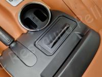 Maserati Quattroporte – Restauro completo delle plastiche appiccicose - Dettaglio delle plastiche sul tunnel centrale. (DOPO)