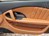 Maserati Quattroporte – Restauro completo delle plastiche appiccicose - Panoramica del pannello porta passeggero. (DOPO)