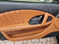 Maserati Quattroporte – Restauro completo delle plastiche appiccicose - Panoramica portiera di guida. (PRIMA)