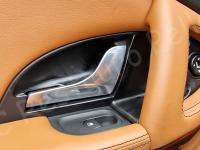 Maserati Quattroporte – Restauro completo delle plastiche appiccicose - Dettaglio plastiche pannello porta posteriore sinistro. (PRIMA)